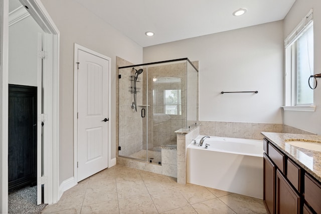 20102 Three Chutes Ln, Cypress, TX 77433 - bathroom featuring a bath, a shower stall, vanity, tile patterned flooring, and recessed lighting