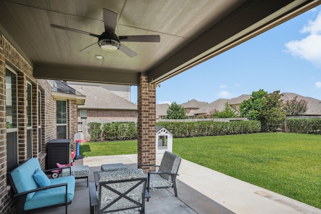 20102 Three Chutes Ln, Cypress, TX 77433 - fenced backyard with a patio, a ceiling fan, and an outdoor hangout area