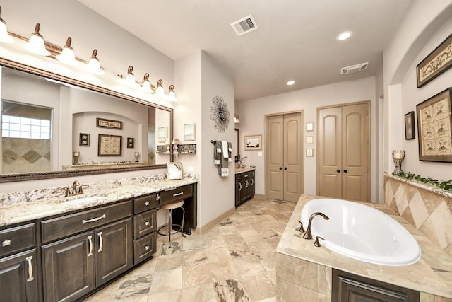 13810 Lake Prt, Cypress, TX 77429 - full bath featuring vanity, a garden tub, and recessed lighting