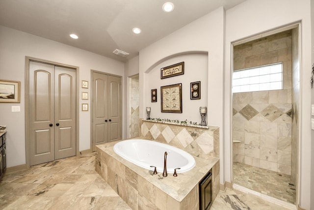 13810 Lake Prt, Cypress, TX 77429 - bathroom with a bath, a tile shower, recessed lighting, vanity, and a closet