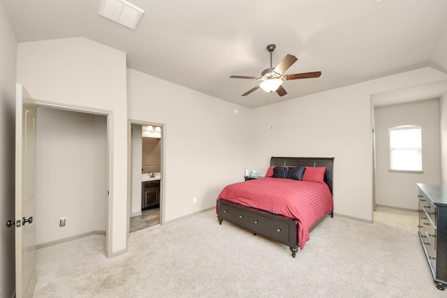 13810 Lake Prt, Cypress, TX 77429 - bedroom featuring lofted ceiling, light colored carpet, connected bathroom, and ceiling fan