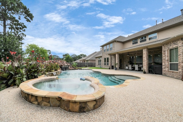 13810 Lake Prt, Cypress, TX 77429 - view of pool featuring a fenced backyard, a patio area, and a pool with connected hot tub