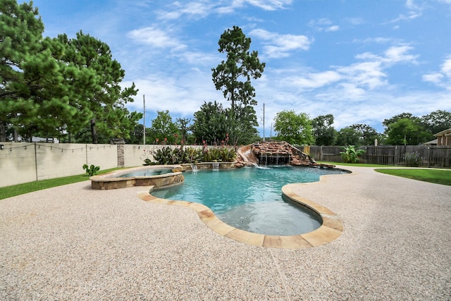 13810 Lake Prt, Cypress, TX 77429 - view of swimming pool featuring a pool with connected hot tub, a fenced backyard, and a patio area