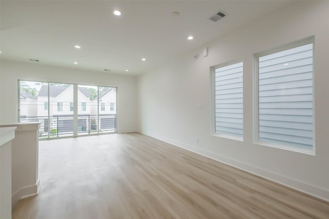 5703C Balbo St, Houston, TX 77091 - unfurnished room with light wood finished floors and recessed lighting