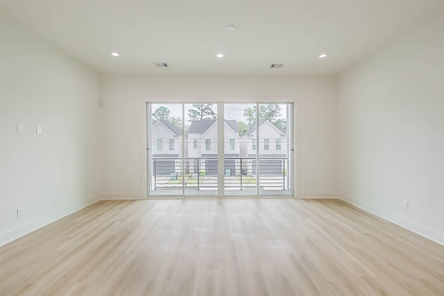 5703C Balbo St, Houston, TX 77091 - unfurnished room featuring light wood-style floors and recessed lighting