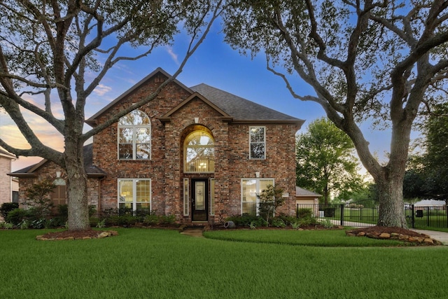 4107 Wentworth Dr, Fulshear, TX 77441 - traditional-style house with brick siding and a shingled roof