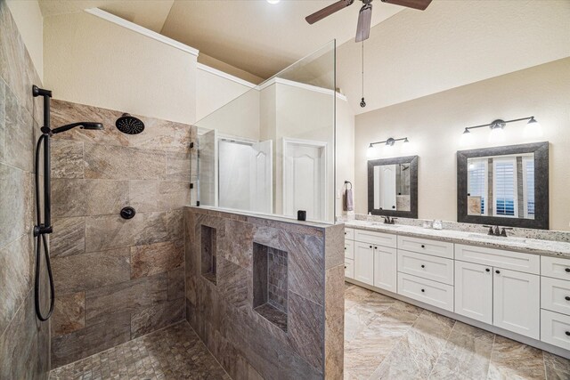4107 Wentworth Dr, Fulshear, TX 77441 - bathroom featuring a walk in shower, double vanity, ceiling fan, and vaulted ceiling