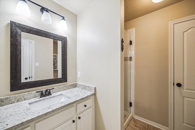4107 Wentworth Dr, Fulshear, TX 77441 - bathroom with a stall shower, vanity, and tile patterned floors