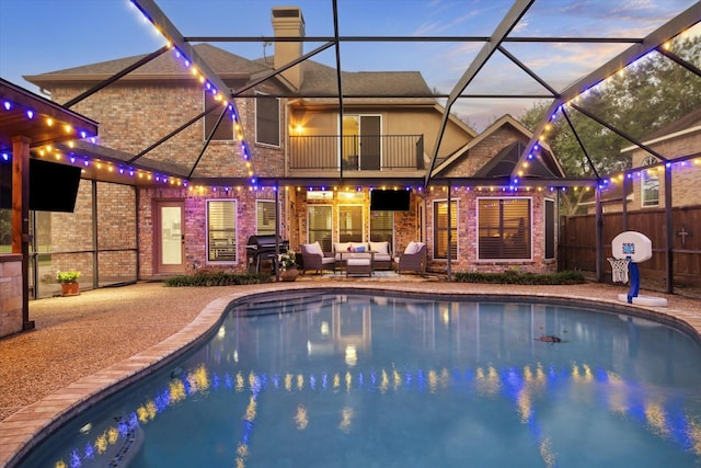 4107 Wentworth Dr, Fulshear, TX 77441 - swimming pool featuring outdoor lounge area, a grill, a patio, and a lanai