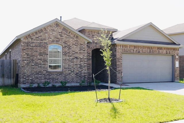 20367 Tembec Dr, New Caney, TX 77357 - view of front of house featuring brick siding, a garage, and concrete driveway