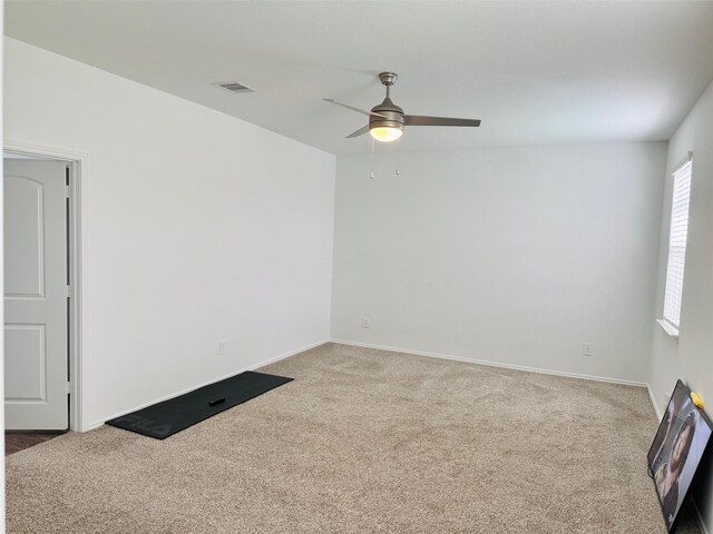 20367 Tembec Dr, New Caney, TX 77357 - spare room with carpet flooring and a ceiling fan