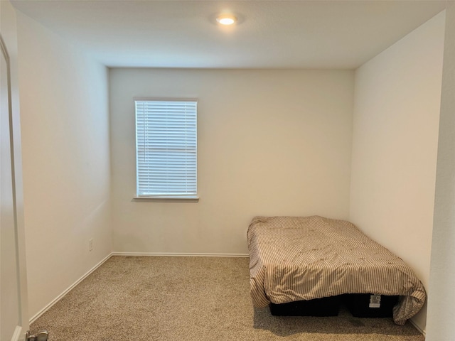 20367 Tembec Dr, New Caney, TX 77357 - carpeted bedroom featuring baseboards