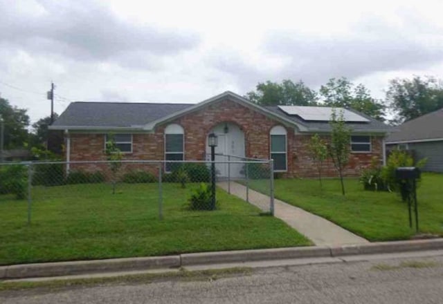 301 S Patricia St, Lacy-Lakeview, TX 76705 - single story home with solar panels and brick siding