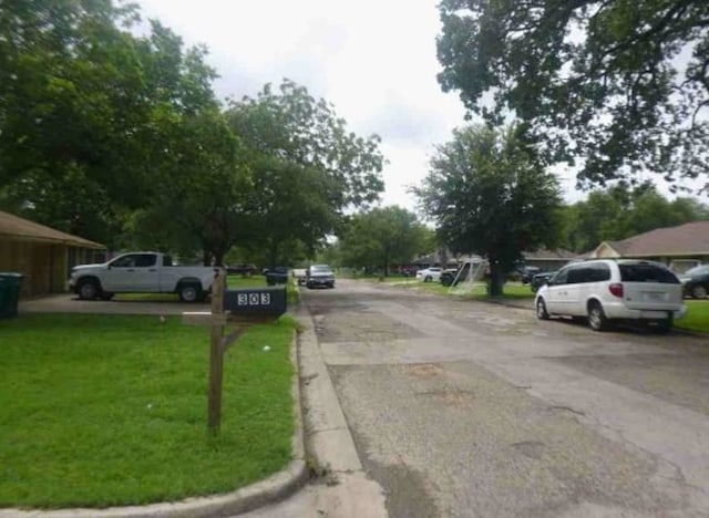 301 S Patricia St, Lacy-Lakeview, TX 76705 - view of asphalt street with curbs