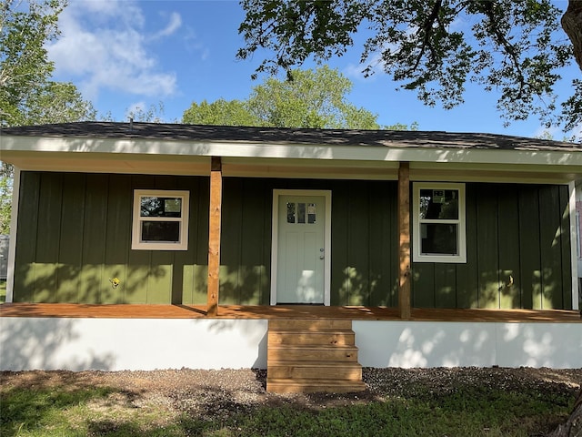 808 Josephine St, Yoakum, TX 77995 - view of front of property featuring covered porch and board and batten siding