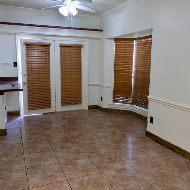 3600 Jeanetta St Unit 1301, Houston, TX 77063 - unfurnished room featuring crown molding, a ceiling fan, and tile patterned flooring