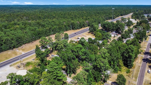 11505 US Highway 190 W, Livingston, TX 77351 - aerial view of property's location featuring a heavily wooded area