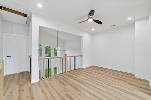 6715 England St, Houston, TX 77021 - unfurnished room featuring attic access, ceiling fan, wood finished floors, lofted ceiling, and recessed lighting