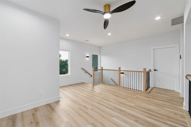 6715 England St, Houston, TX 77021 - spare room featuring light wood-style flooring, ceiling fan, and recessed lighting