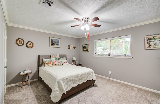 9818 Emnora Ln, Houston, TX 77080 - carpeted bedroom featuring ornamental molding, a ceiling fan, and a textured ceiling