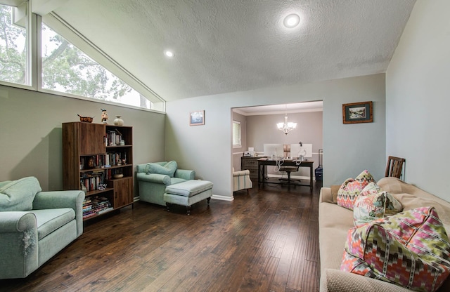 9818 Emnora Ln, Houston, TX 77080 - living room with dark wood-type flooring, a textured ceiling, a chandelier, vaulted ceiling, and a desk