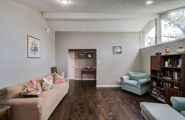 9818 Emnora Ln, Houston, TX 77080 - living room with wood finished floors, a textured ceiling, and recessed lighting