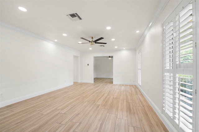 3815 Latma Dr, Houston, TX 77025 - spare room with ornamental molding, a ceiling fan, recessed lighting, and light wood finished floors
