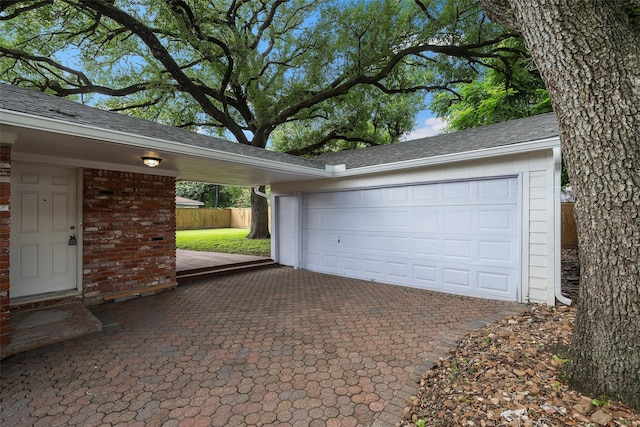 3815 Latma Dr, Houston, TX 77025 - garage featuring decorative driveway