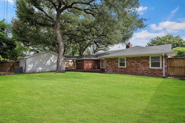 3815 Latma Dr, Houston, TX 77025 - back of house with a chimney, brick siding, and a shingled roof