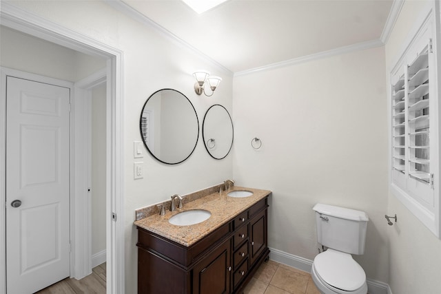 3815 Latma Dr, Houston, TX 77025 - bathroom featuring double vanity, crown molding, and tile patterned flooring