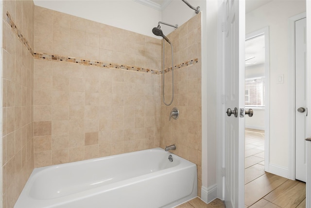3815 Latma Dr, Houston, TX 77025 - bathroom featuring  shower combination, tile patterned flooring, and crown molding