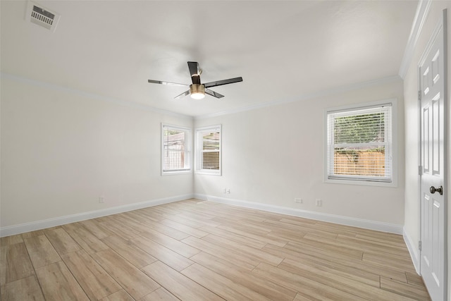 3815 Latma Dr, Houston, TX 77025 - unfurnished room with crown molding, a ceiling fan, healthy amount of natural light, and light wood-style flooring