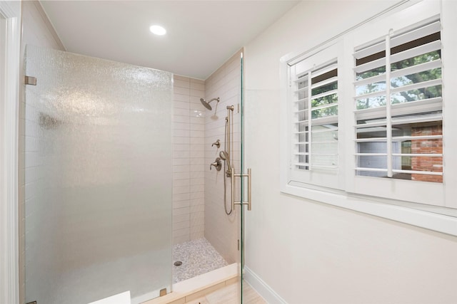 3815 Latma Dr, Houston, TX 77025 - bathroom with a shower stall and recessed lighting