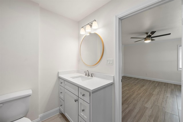 3815 Latma Dr, Houston, TX 77025 - bathroom with vanity, wood finished floors, and a ceiling fan