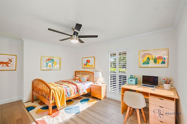3815 Latma Dr, Houston, TX 77025 - bedroom with crown molding, light wood-type flooring, an office area, and ceiling fan