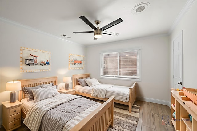3815 Latma Dr, Houston, TX 77025 - bedroom with crown molding, wood finished floors, and ceiling fan
