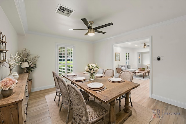 3815 Latma Dr, Houston, TX 77025 - dining area featuring ceiling fan, light wood-type flooring, and ornamental molding