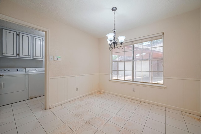 2823 W Pebble Beach Dr, Missouri City, TX 77459 - unfurnished room with independent washer and dryer, a chandelier, wainscoting, and light tile patterned floors