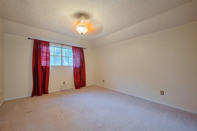 2823 W Pebble Beach Dr, Missouri City, TX 77459 - spare room with carpet flooring and a textured ceiling