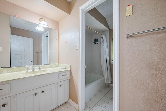 2823 W Pebble Beach Dr, Missouri City, TX 77459 - full bath with tile patterned floors, vanity, shower / bathtub combination with curtain, and a textured wall