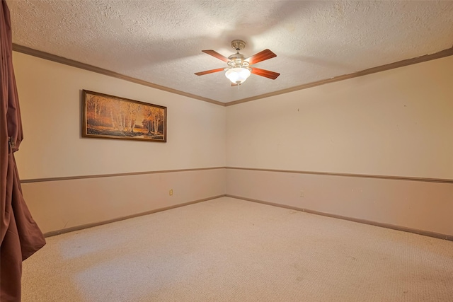 2823 W Pebble Beach Dr, Missouri City, TX 77459 - carpeted empty room featuring crown molding, ceiling fan, and a textured ceiling