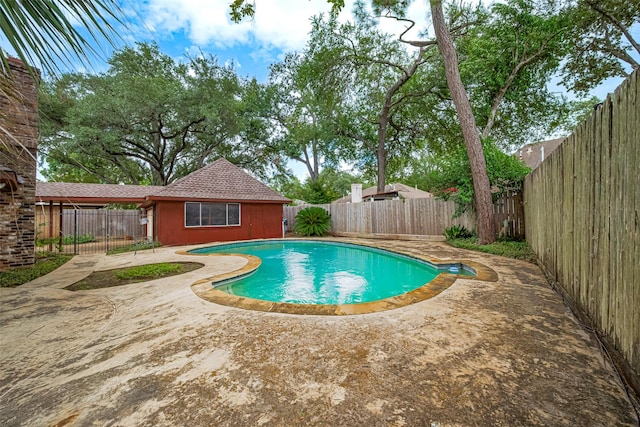 2823 W Pebble Beach Dr, Missouri City, TX 77459 - view of swimming pool with a patio and a fenced backyard