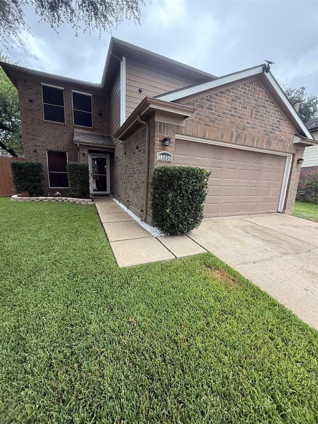 13202 Chasworth Dr, Houston, TX 77041 - view of front facade featuring concrete driveway, an attached garage, brick siding, and a front lawn