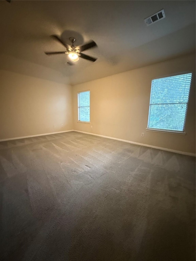 13202 Chasworth Dr, Houston, TX 77041 - unfurnished room with dark colored carpet, ceiling fan, and vaulted ceiling