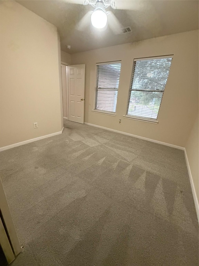 13202 Chasworth Dr, Houston, TX 77041 - carpeted spare room featuring baseboards and a ceiling fan