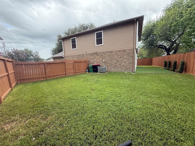 13202 Chasworth Dr, Houston, TX 77041 - rear view of house featuring brick siding and a fenced backyard
