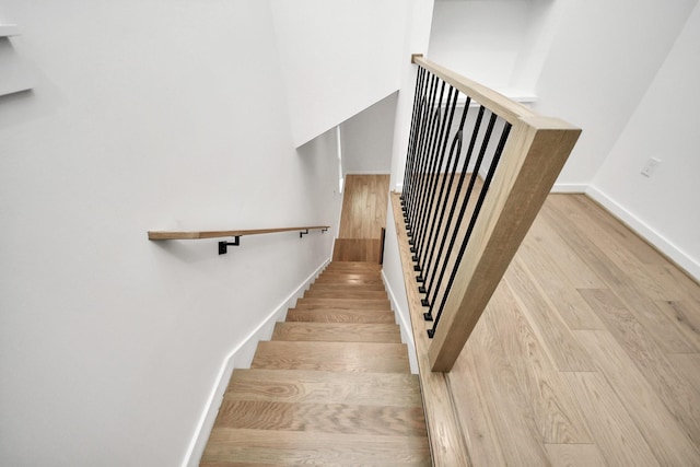 3907 Sumpter St, Houston, TX 77020 - stairway with wood finished floors and baseboards