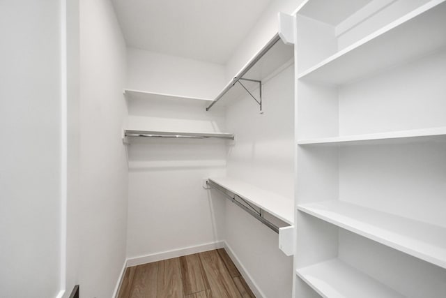3907 Sumpter St, Houston, TX 77020 - walk in closet with wood finished floors