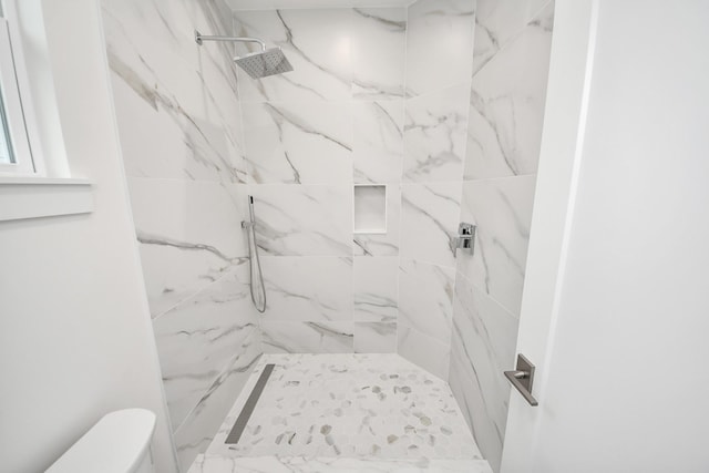 3907 Sumpter St, Houston, TX 77020 - full bathroom featuring toilet and a marble finish shower