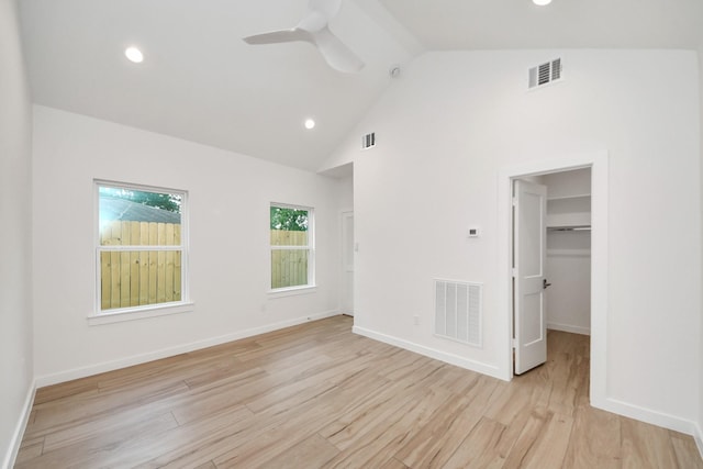 3907 Sumpter St, Houston, TX 77020 - empty room featuring a ceiling fan, light wood finished floors, high vaulted ceiling, and recessed lighting